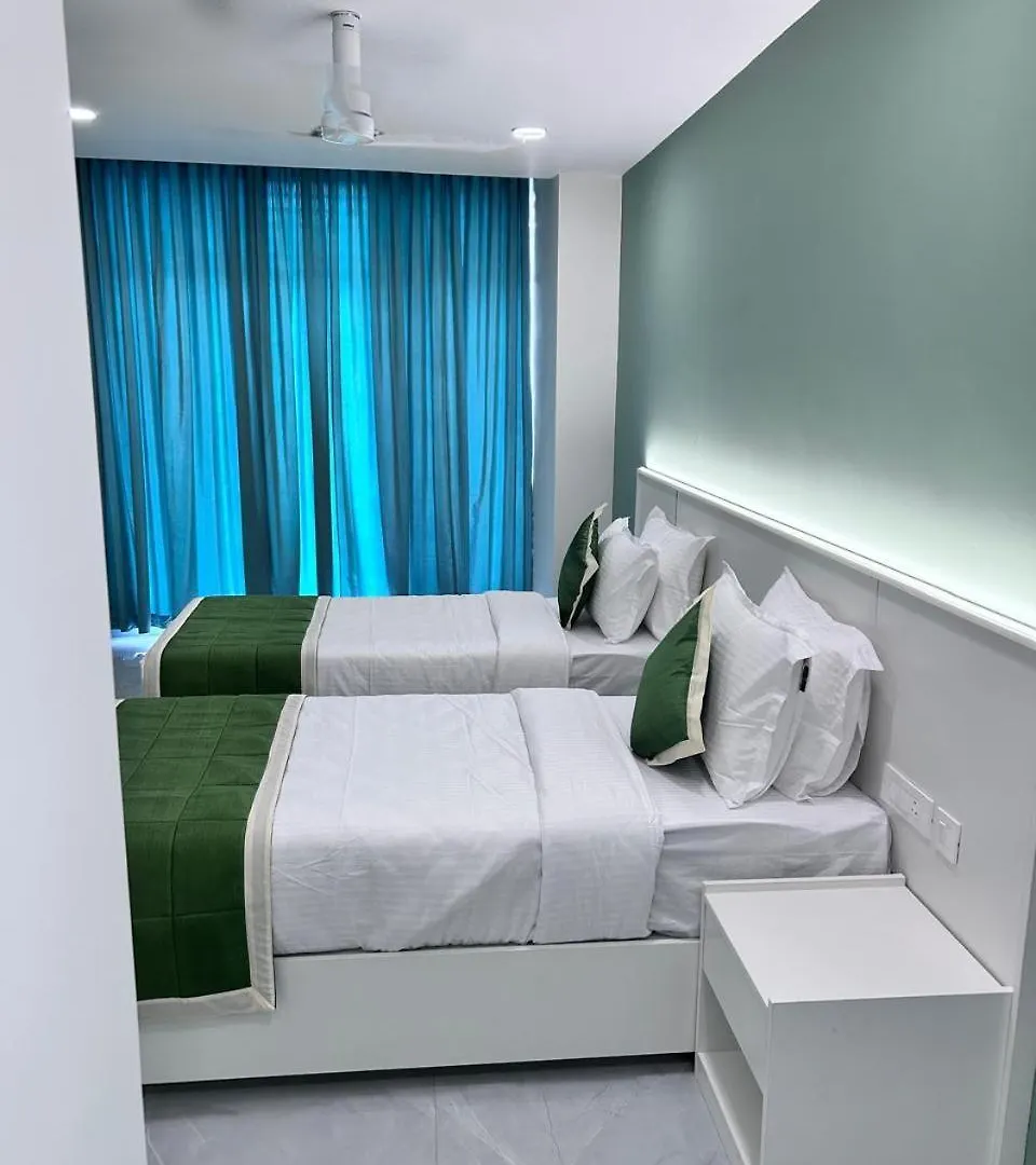 Grace Suites Коччи Отель